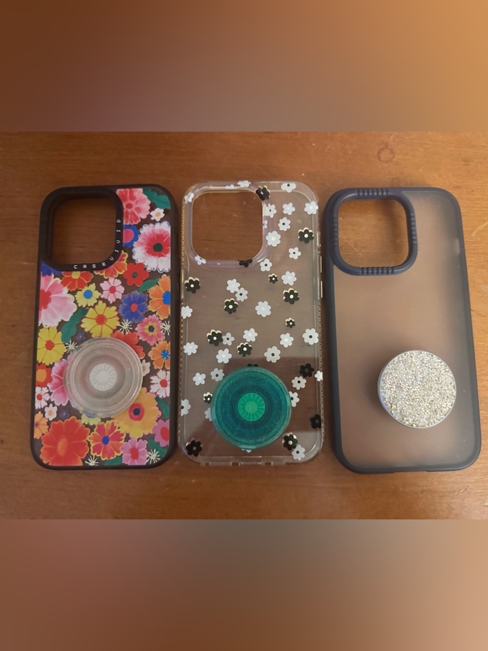 iPhone 14 Pro Case lot with pop sockets